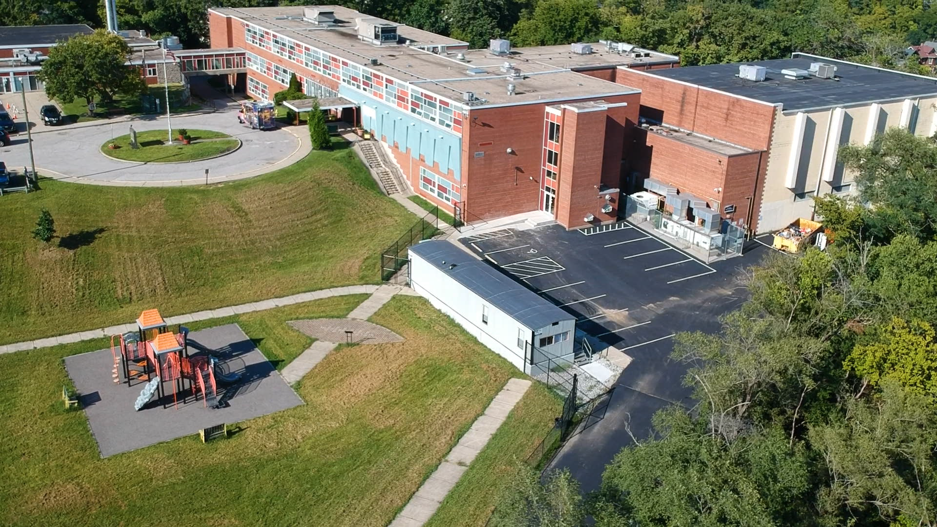 this is drone shot of Project's Connect safe sleep lot located at William Howard Taft Elementary